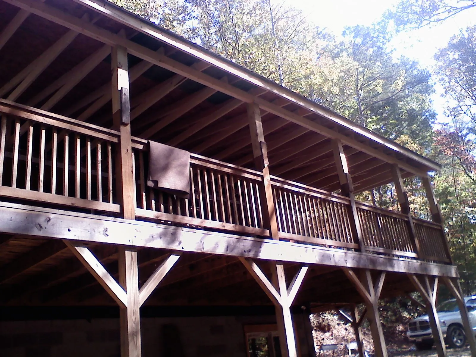 Timber framing under a new elevated porch and deck — Roof Leak Repair in Attica by Roofing Brothers